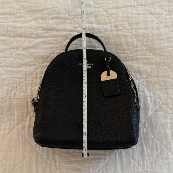 black camo north face backpack The Hot Shot and 8 inches deep Ful Sling Crossbody Bag Color:Purple Canary HOOK-9